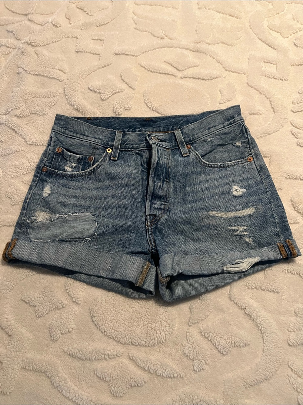 Levi's 501 Light Blue Distressed Rolled-Hem Jean Shorts